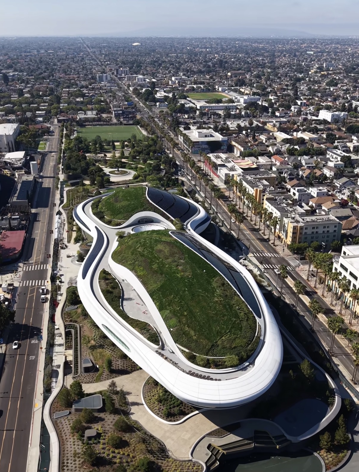 Aerial view of the Lucas Museum and its gardens in Exposition Park